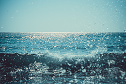 A view of the ocean that appears to be salty